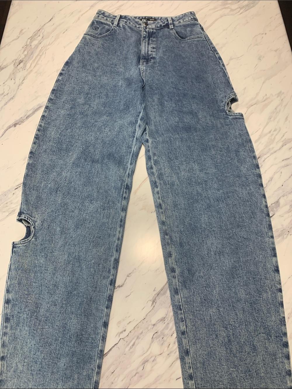 High-Rise Light Blue Boyfriend Jeans with Cutout Detail